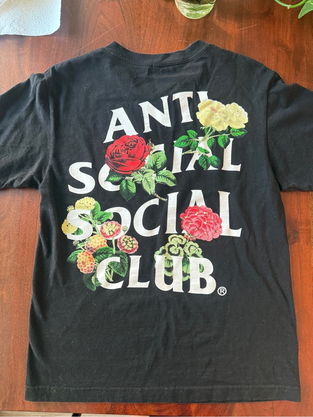 Anti Social Social Club Black Tee with Red and Green Floral Logo